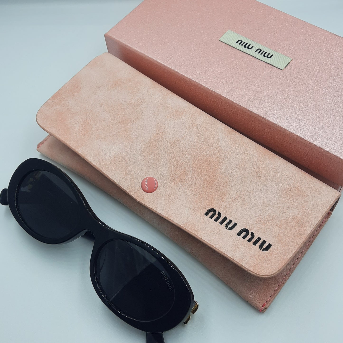 Solaires: MIUMIU SM06Z Noir/Doré