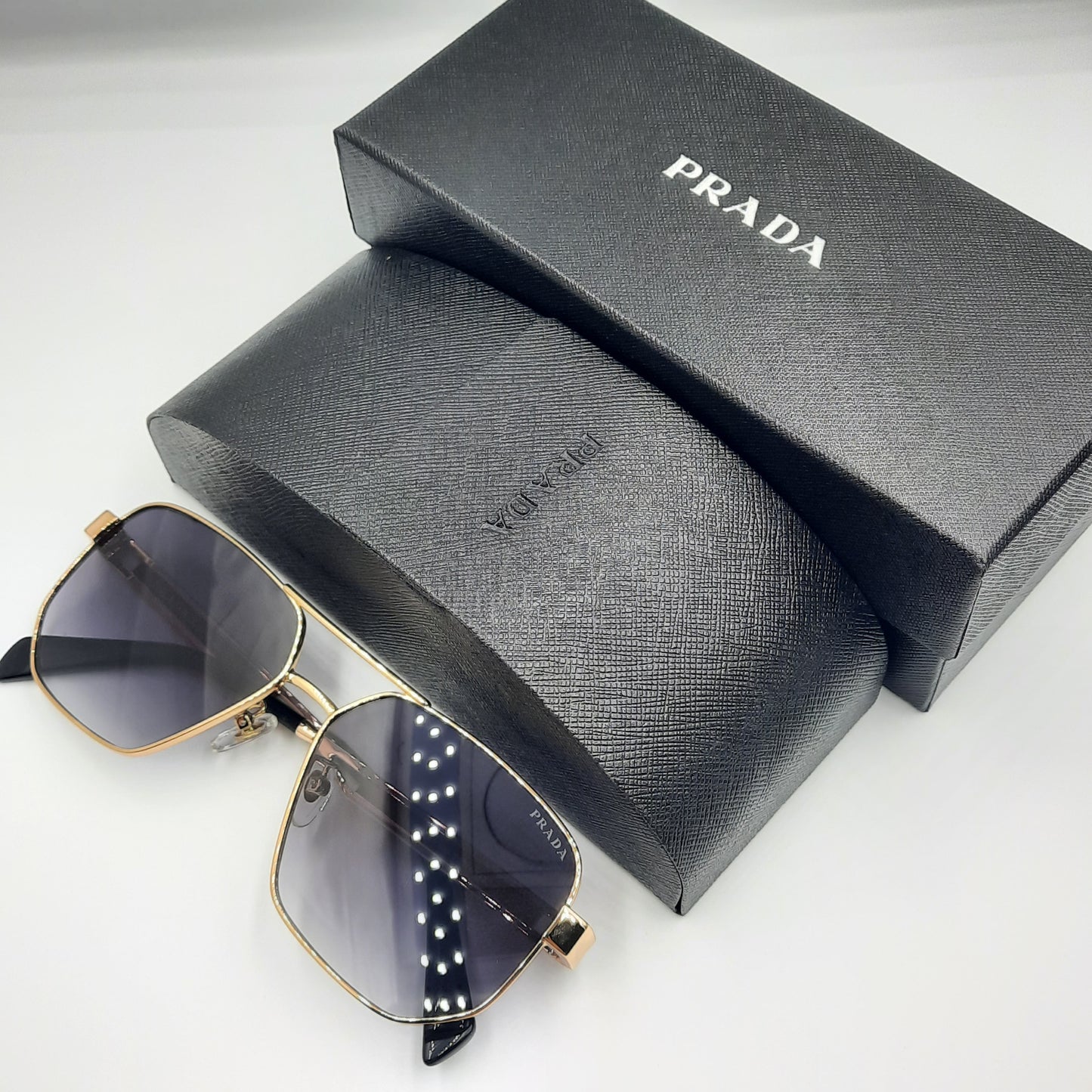 Solaires: PRADA OPS51ZS rouge doré noir