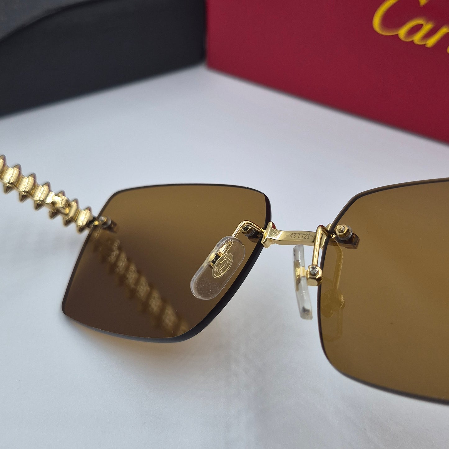 Solaires: CARTIER CLASH CT0545S doré marron