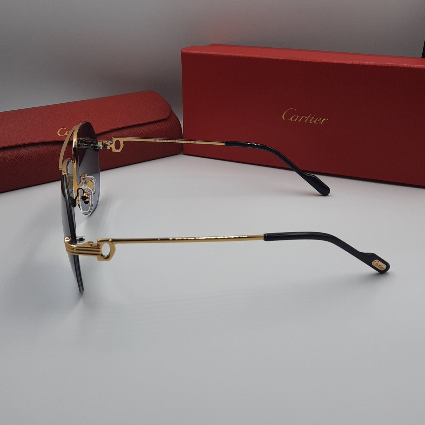 Solaires: CARTIER semi percé CT0427S doré noir