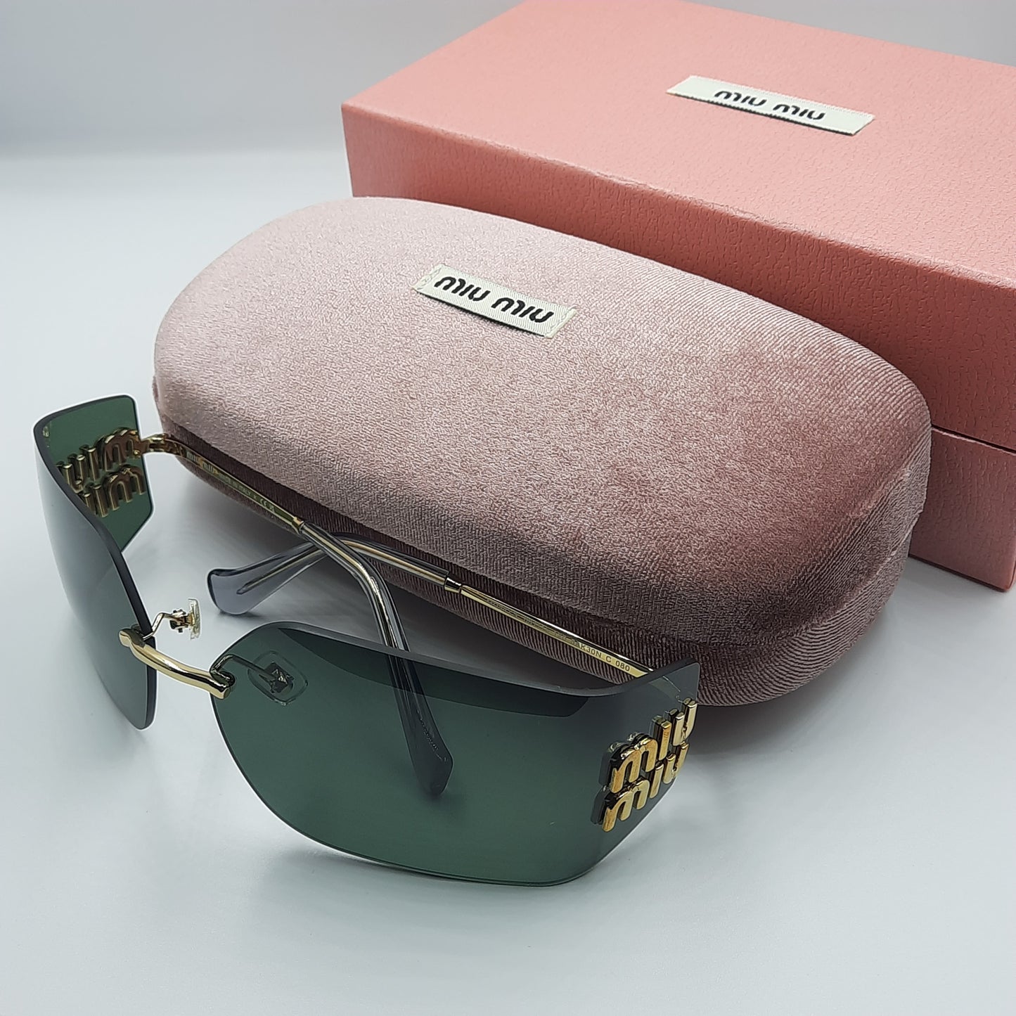 Solaires: MIUMIU MU54YS vert/GOLD
