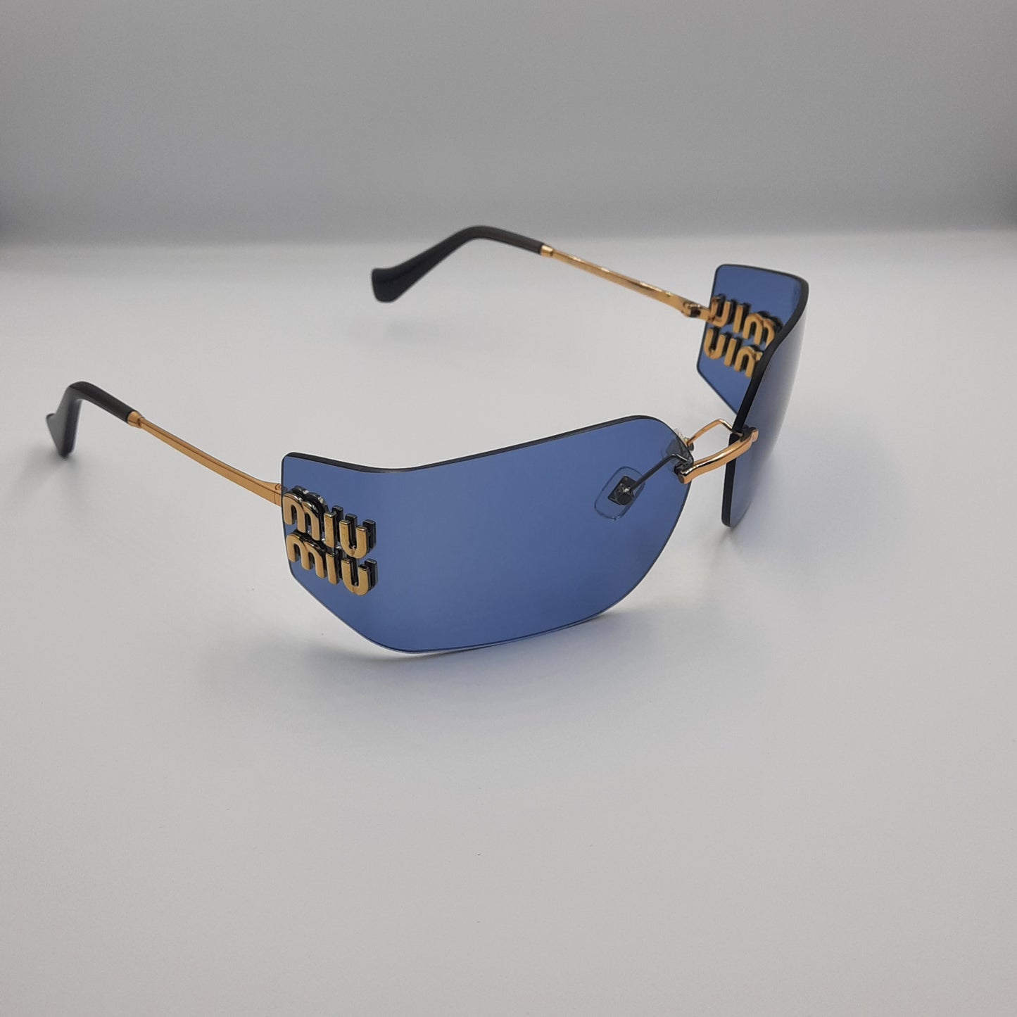Solaires: MIUMIU MU54YS bleu/GOLD