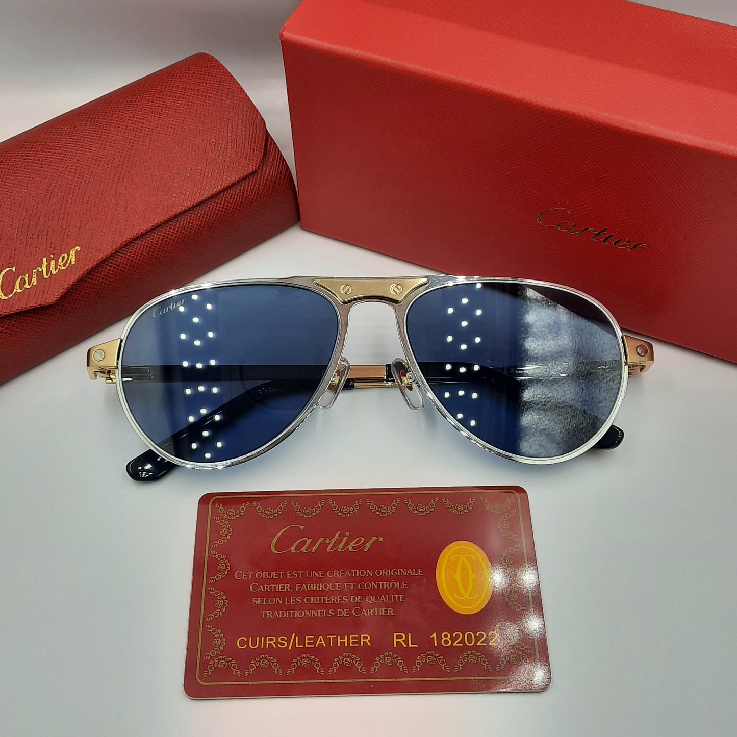Solaires: CARTIER SANTOS CT0533S doré bleu foncé