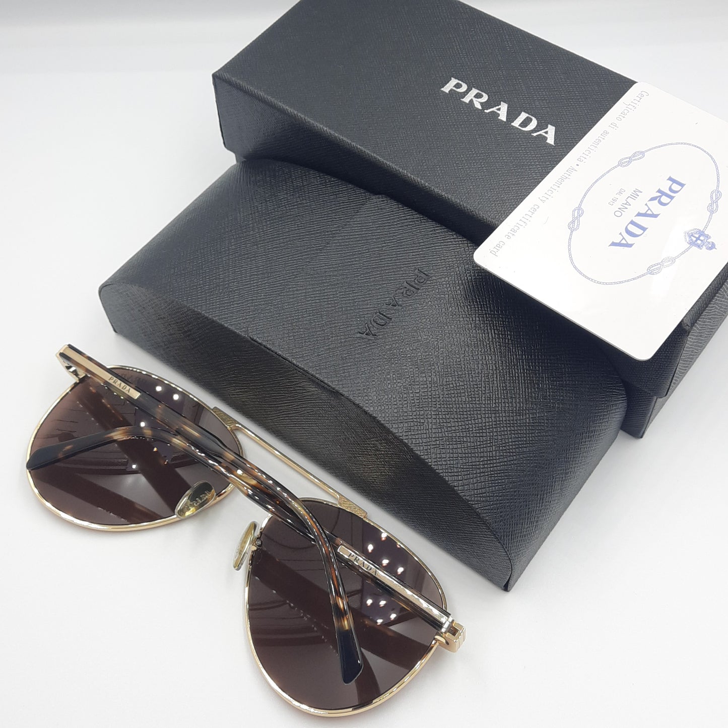 Solaires: PRADA SPRA58 doré marron havane