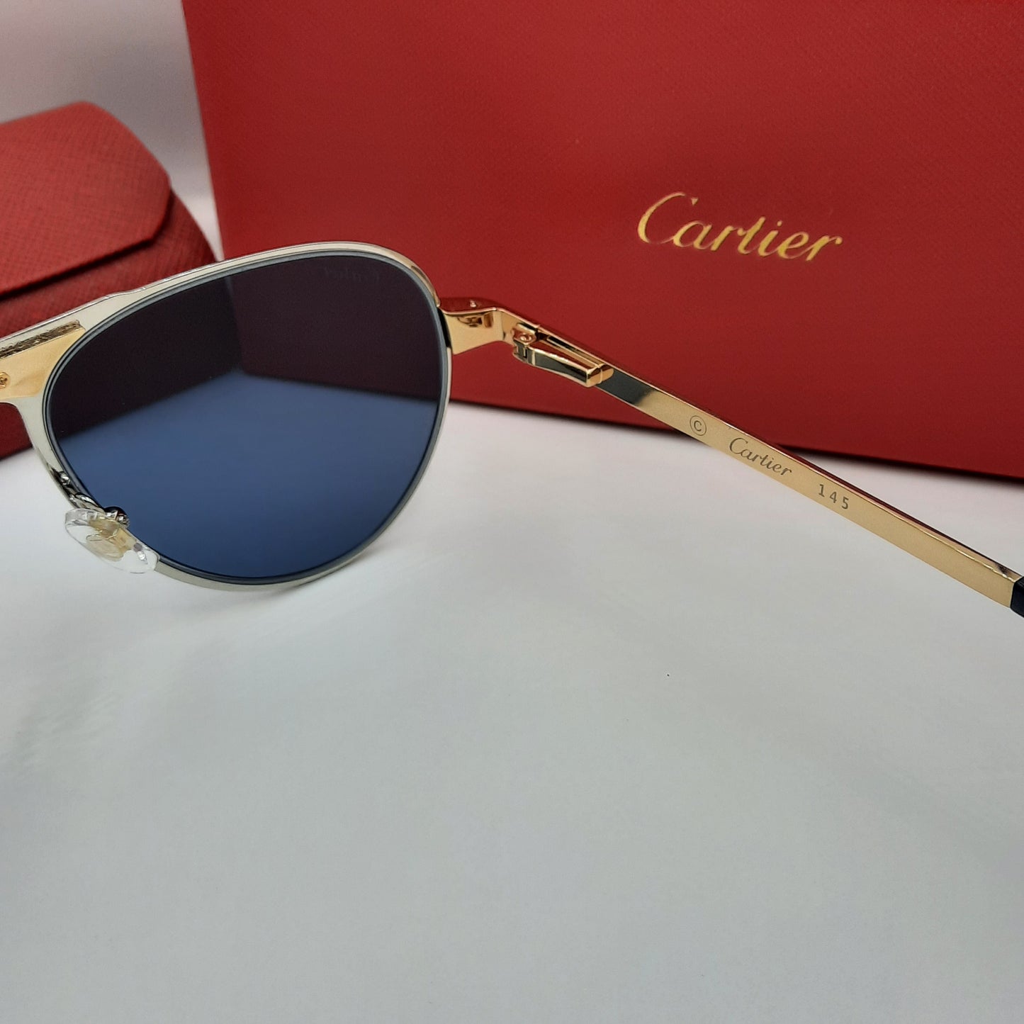 Solaires: CARTIER SANTOS CT0533S doré bleu foncé