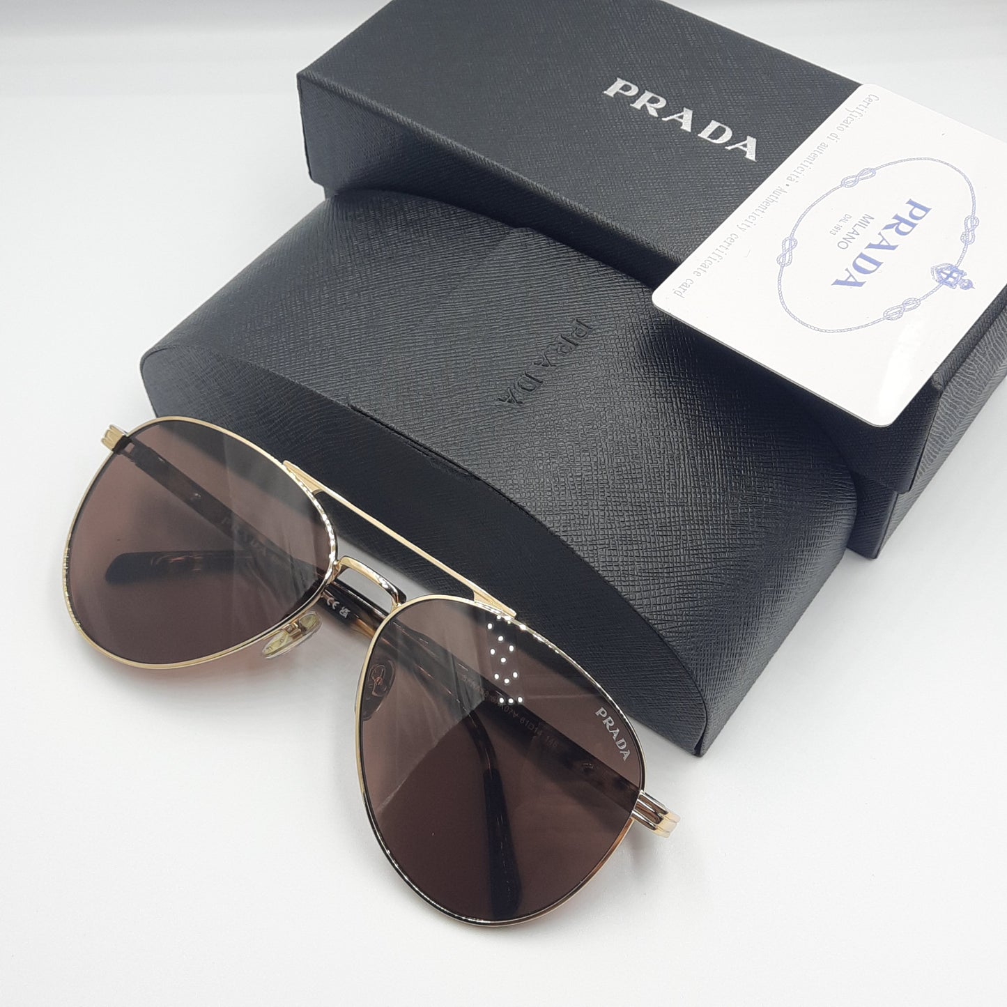 Solaires: PRADA SPRA58 doré marron havane