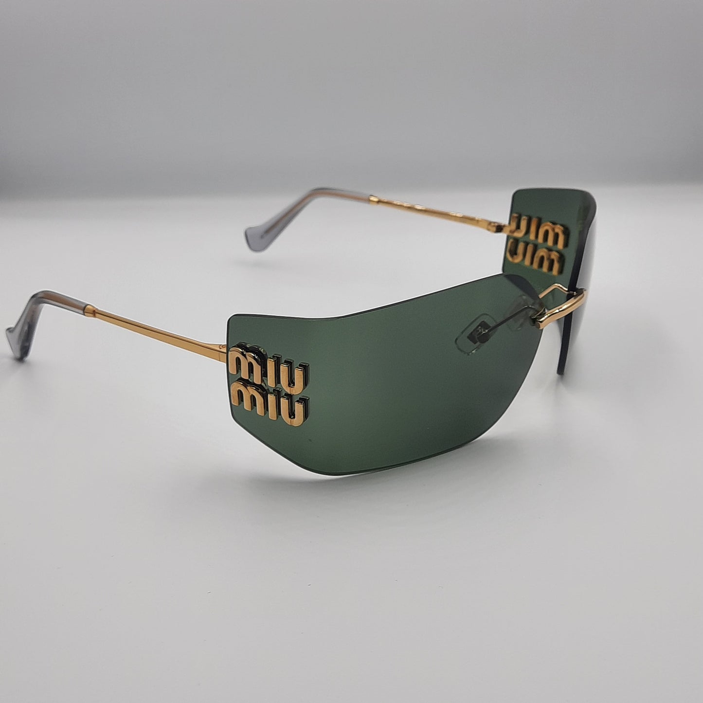 Solaires: MIUMIU MU54YS vert/GOLD