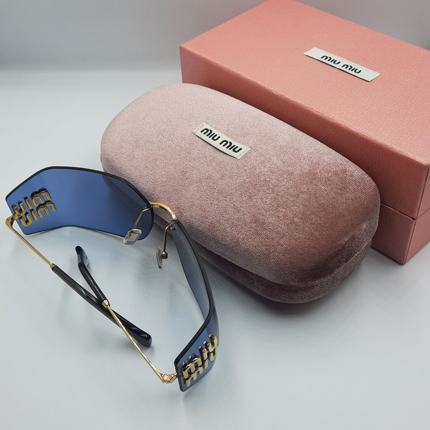 Solaires: MIUMIU MU54YS bleu/GOLD