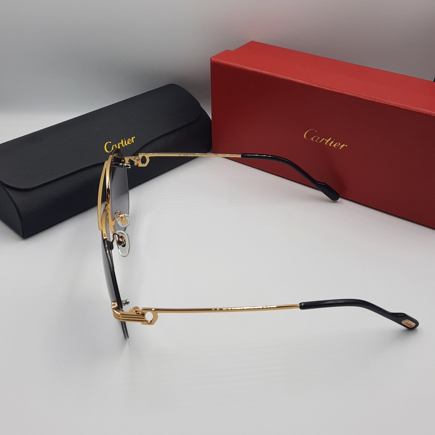 Solaires: CARTIER semi percé CT0427S doré noir