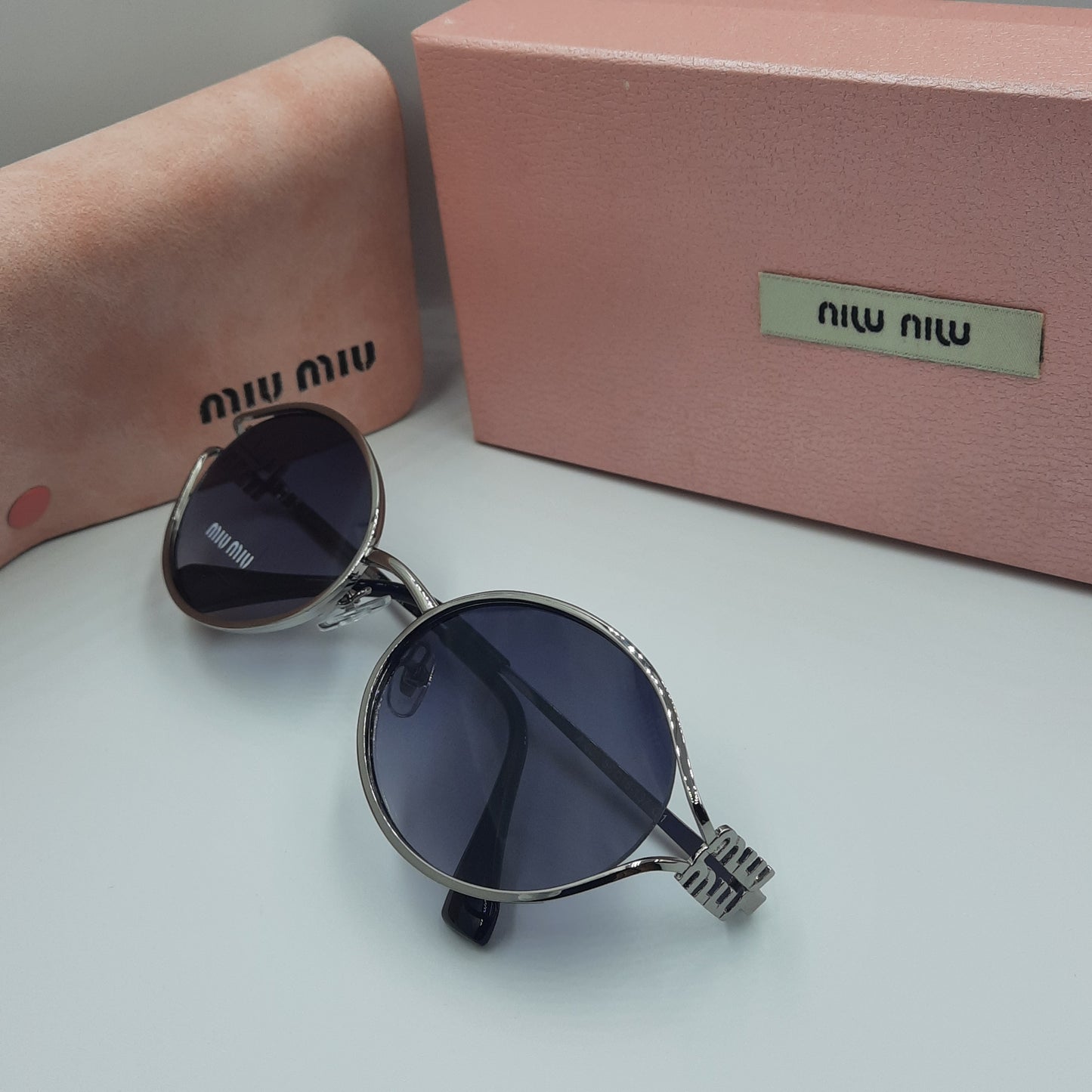 Solaires: MIUMIU argenté