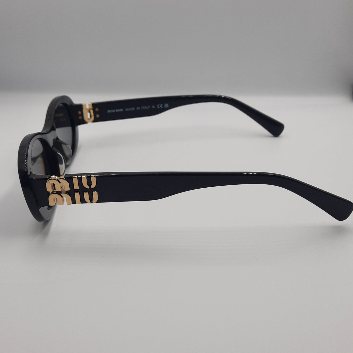 Solaires: MIUMIU SM06Z Noir/Doré