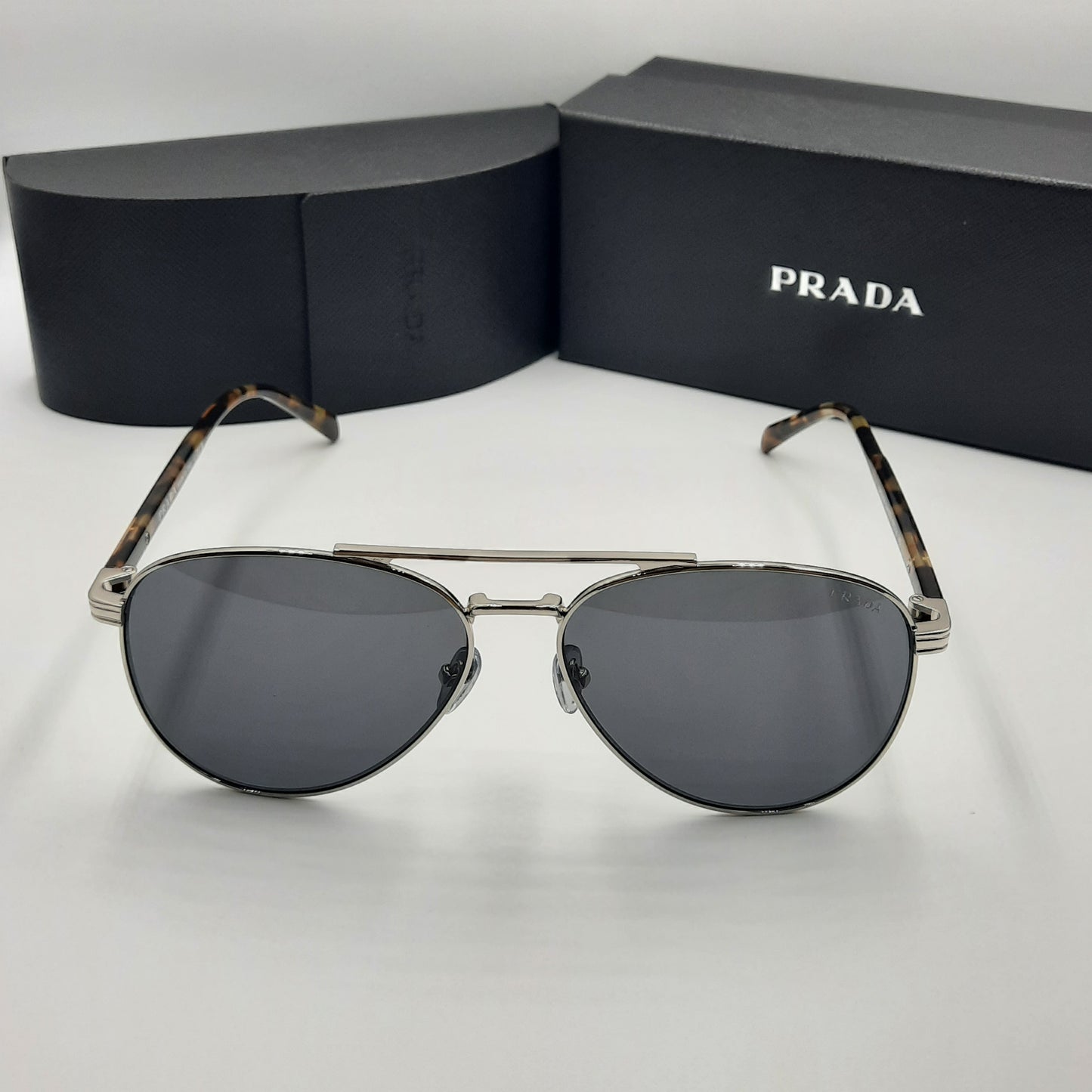 Solaires: PRADA SPRA58 argent tortoise