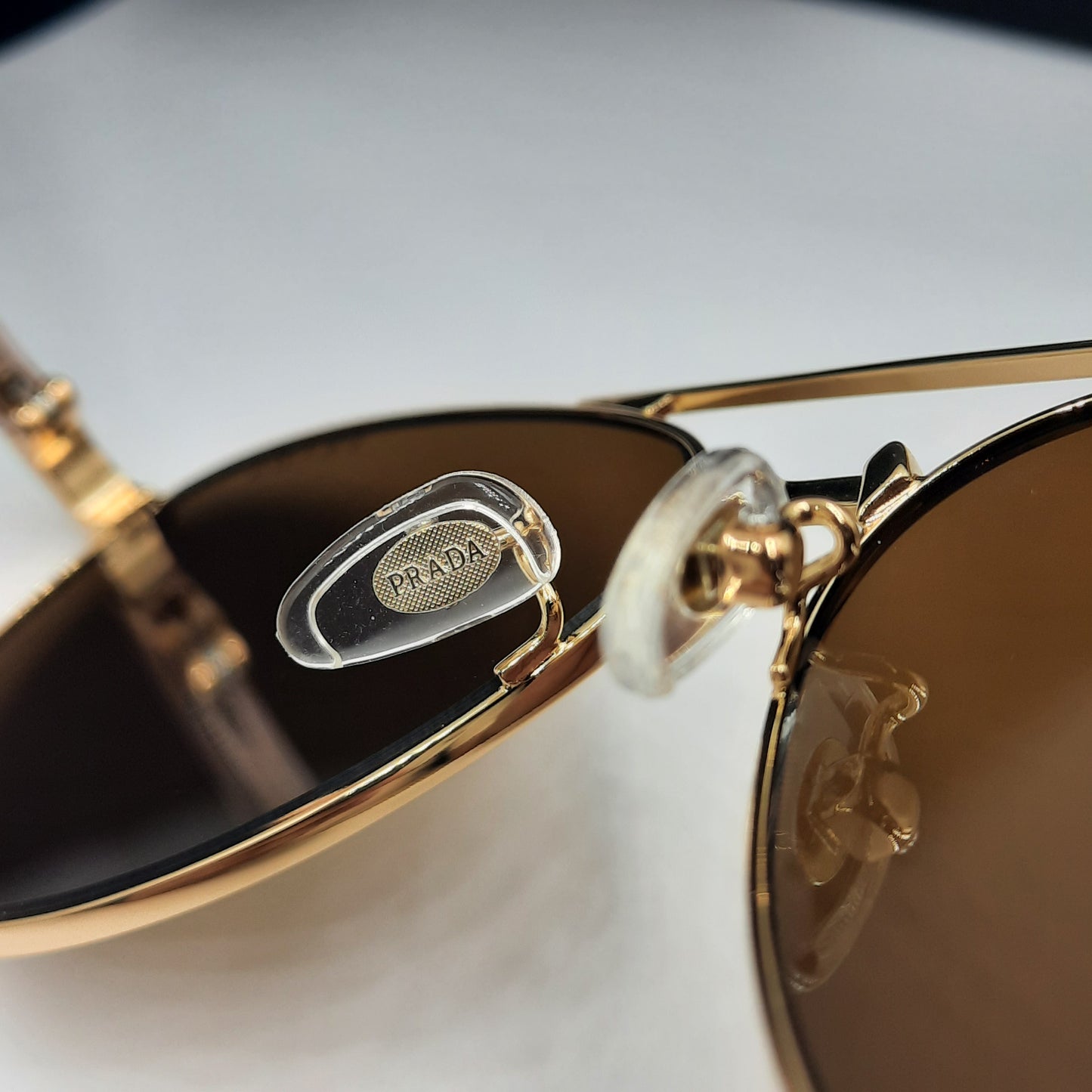 Solaires: PRADA SPRA58 rose gold