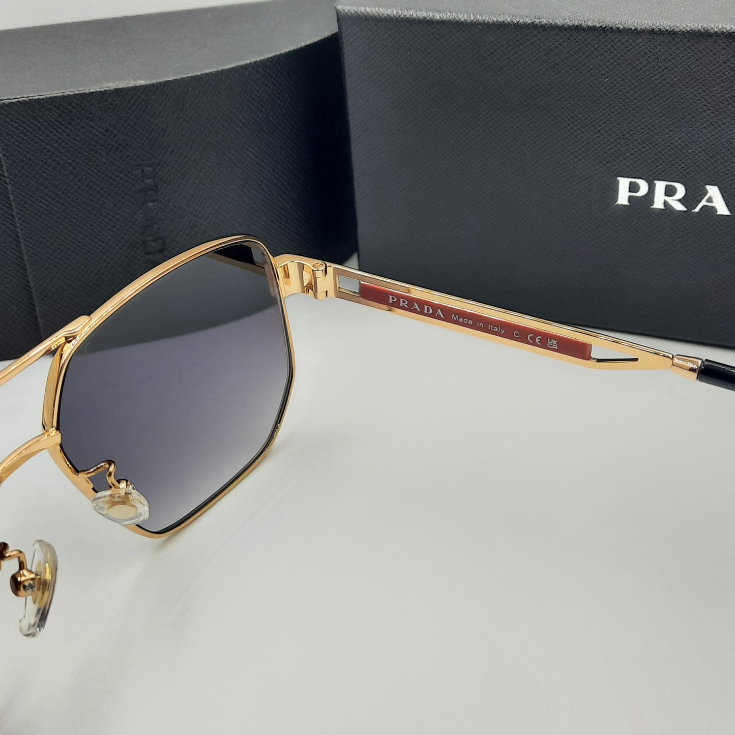 Solaires: PRADA OPS51ZS rouge doré noir