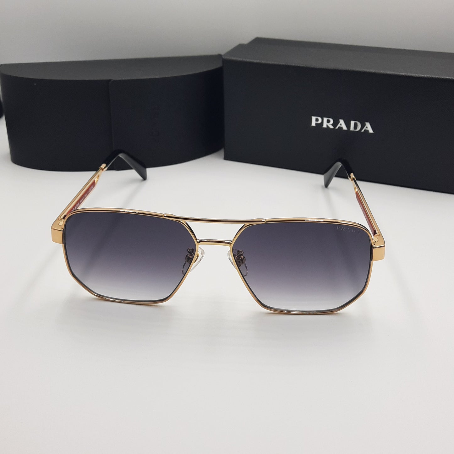 Solaires: PRADA OPS51ZS rouge doré noir