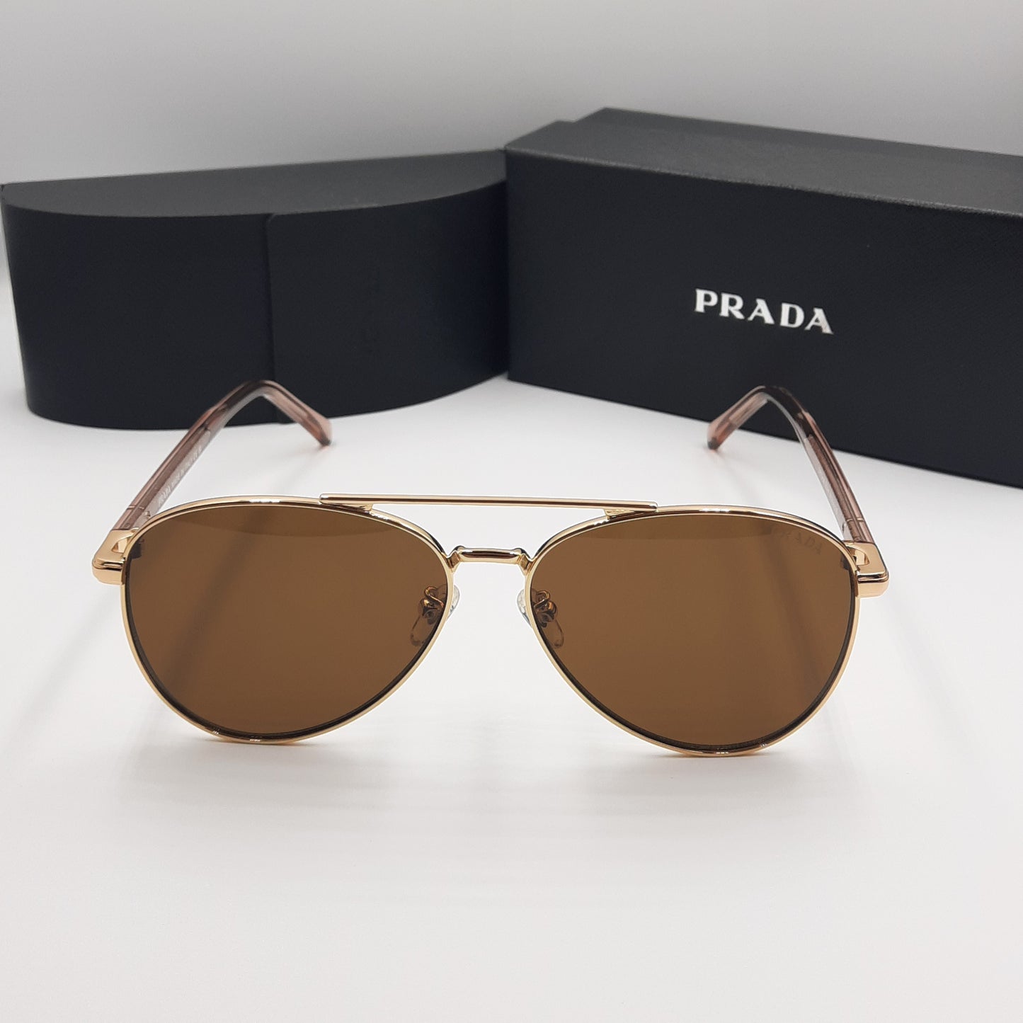 Solaires: PRADA SPRA58 rose gold