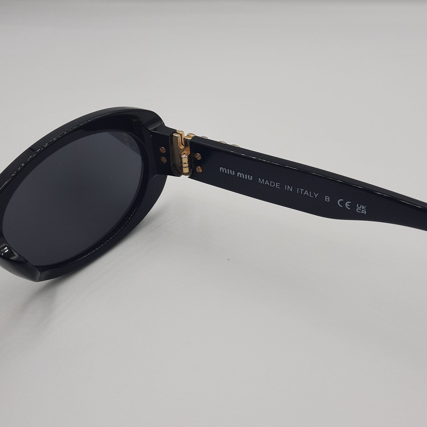 Solaires: MIUMIU SM06Z Noir/Doré