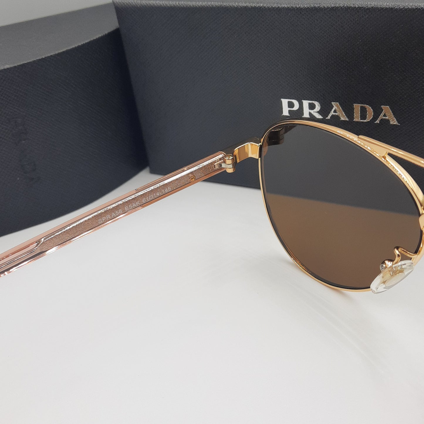 Solaires: PRADA SPRA58 rose gold