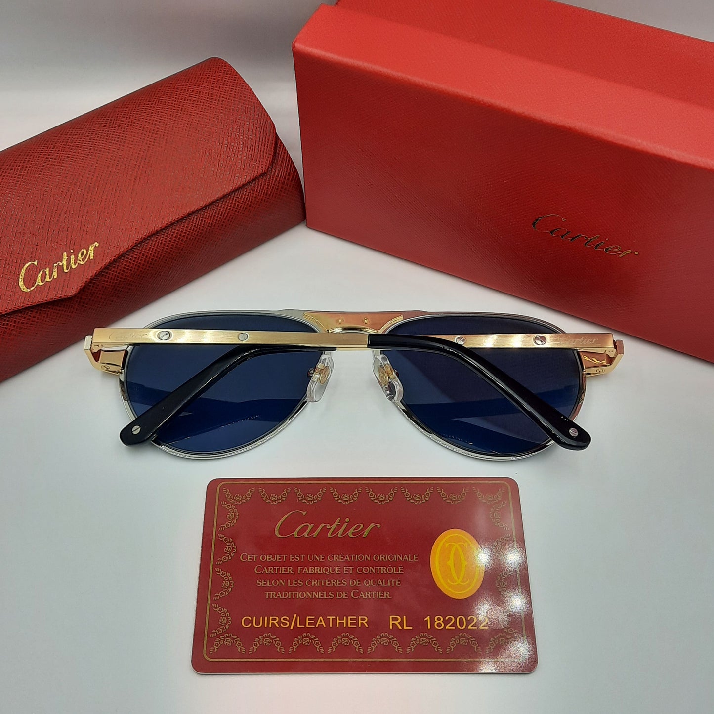 Solaires: CARTIER SANTOS CT0533S doré bleu foncé