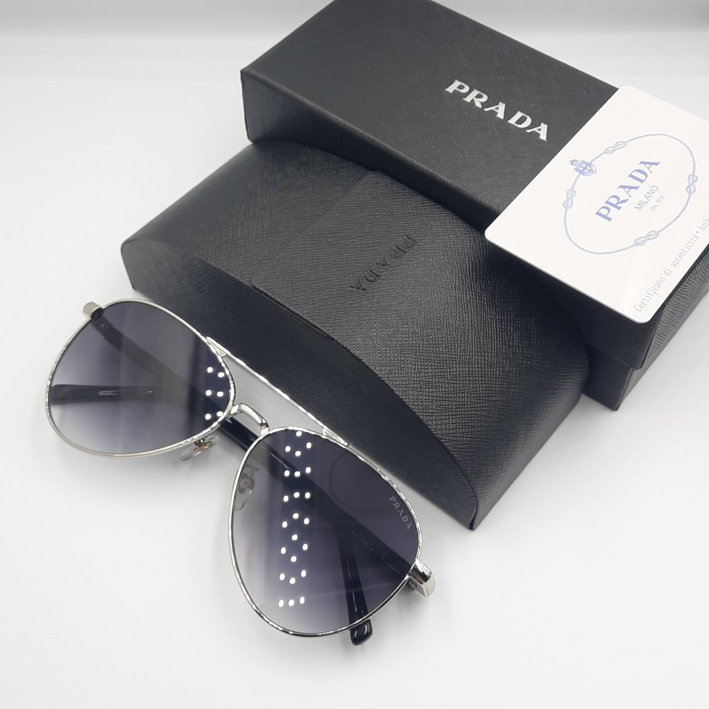 Solaires: PRADA SPRA58 argent noir deg