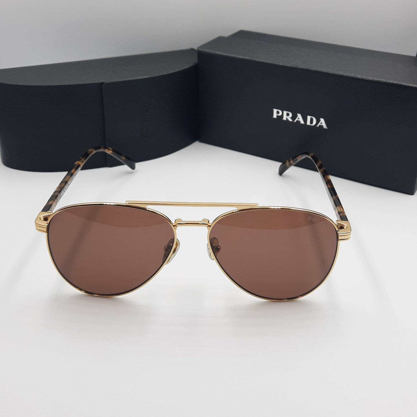 Solaires: PRADA SPRA58 doré marron havane