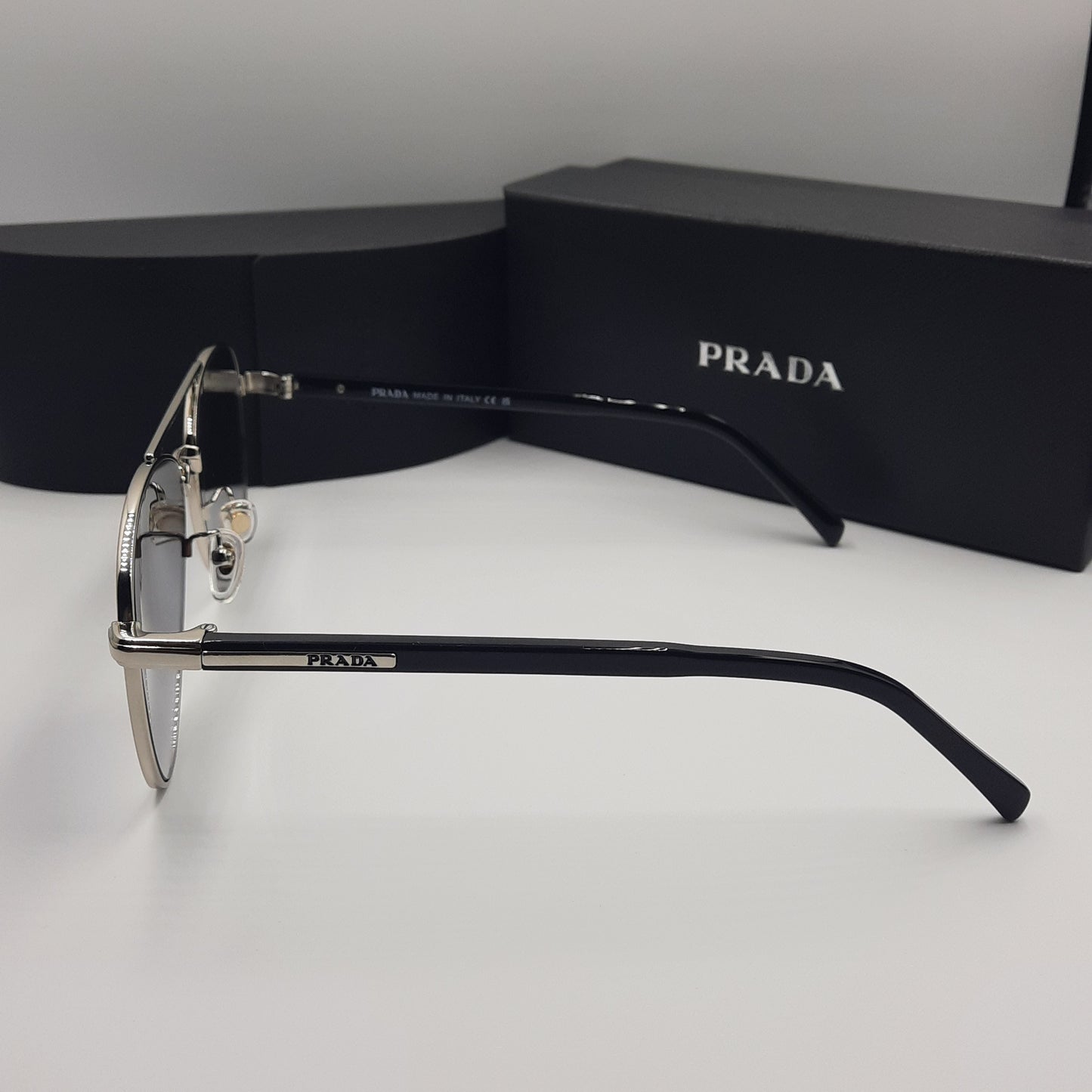 Solaires: PRADA SPRA58 argent noir deg
