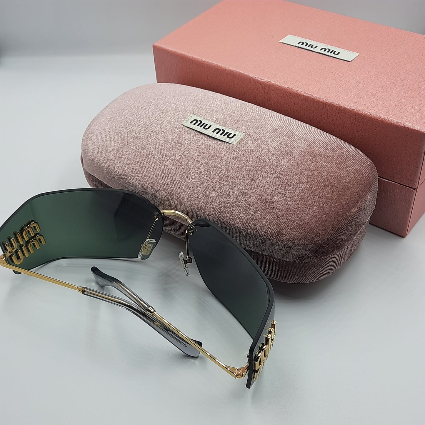 Solaires: MIUMIU MU54YS vert/GOLD