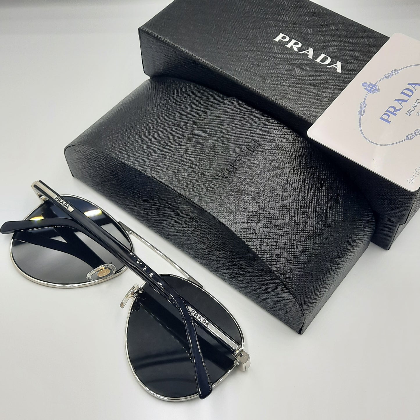 Solaires: PRADA SPRA58 argent noir