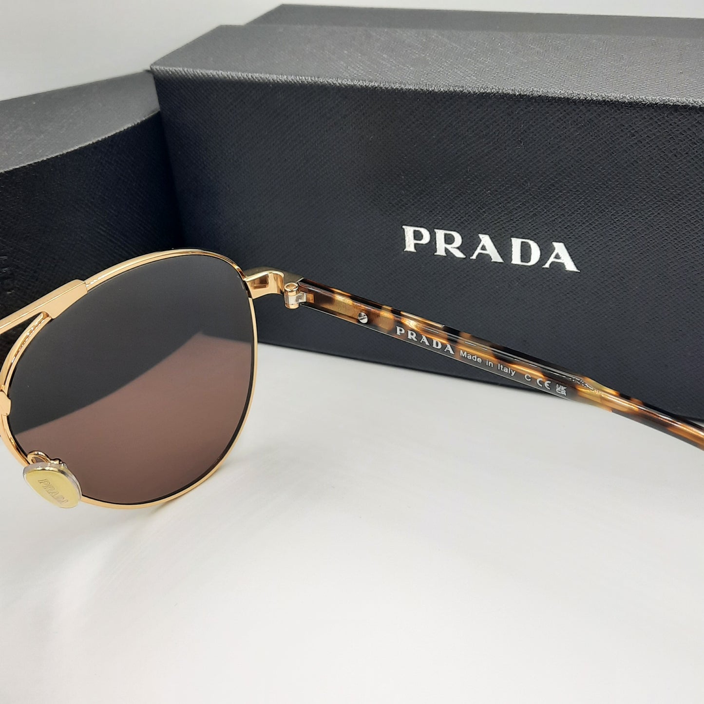 Solaires: PRADA SPRA58 doré marron havane