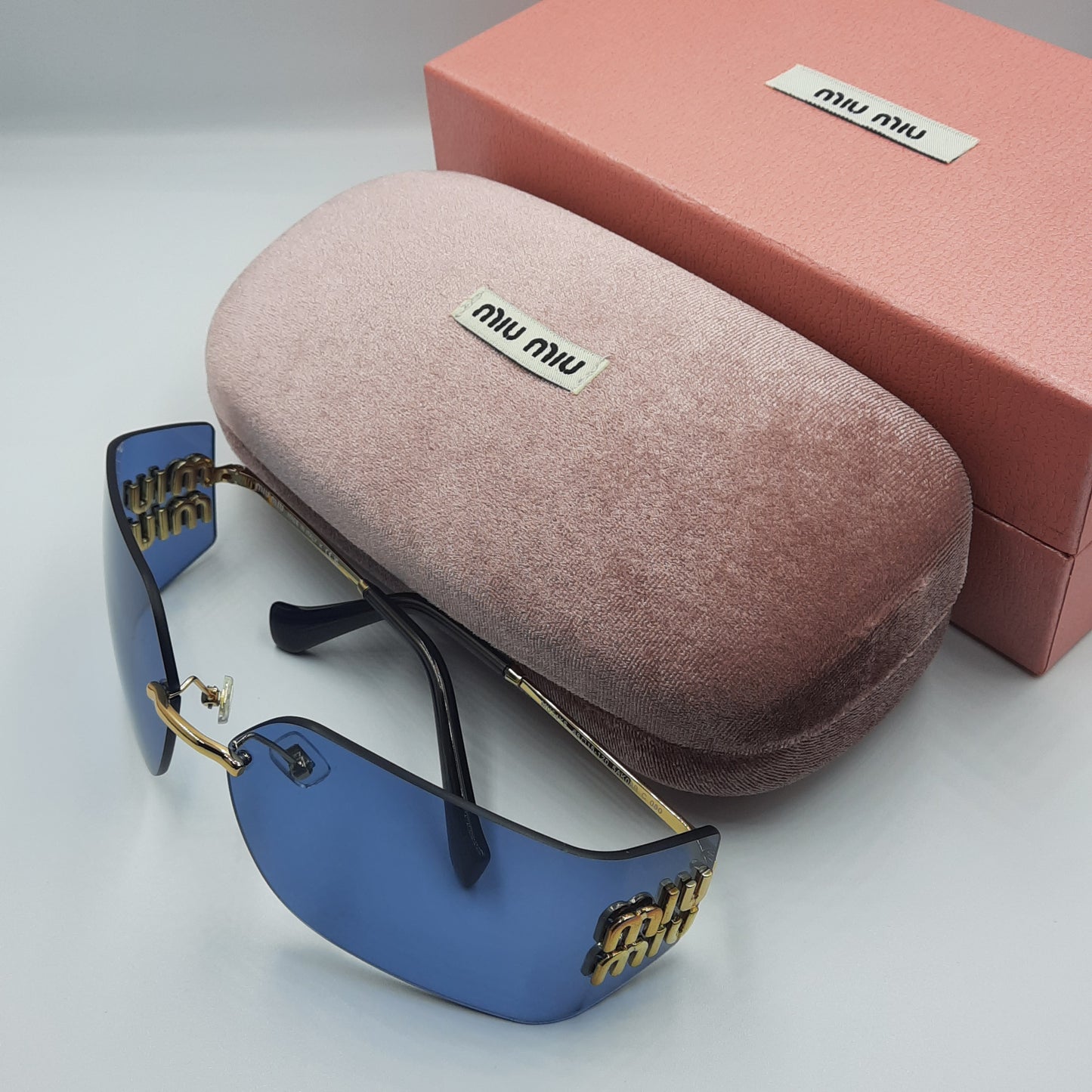 Solaires: MIUMIU MU54YS bleu/GOLD