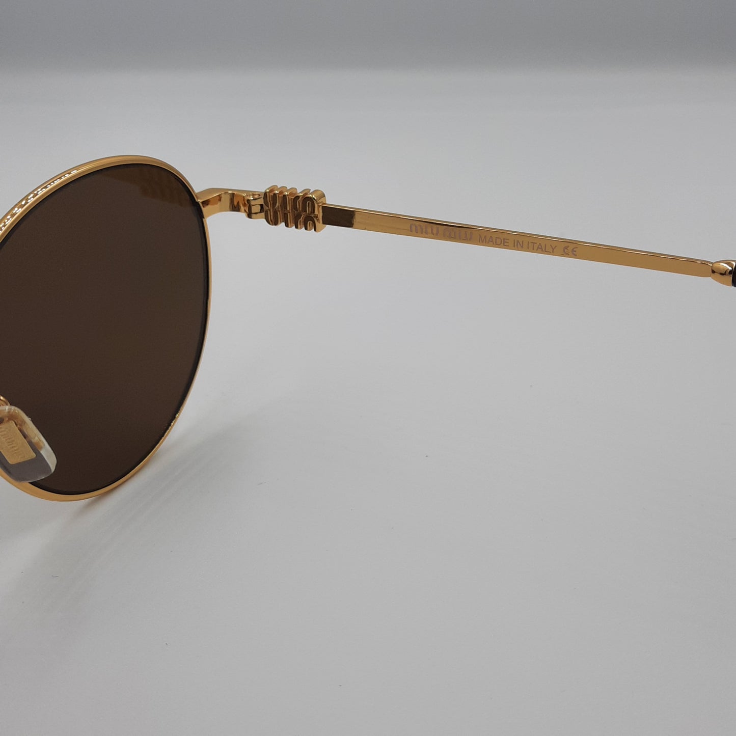 Solaires: MIUMIU SMU55ZS doré marron