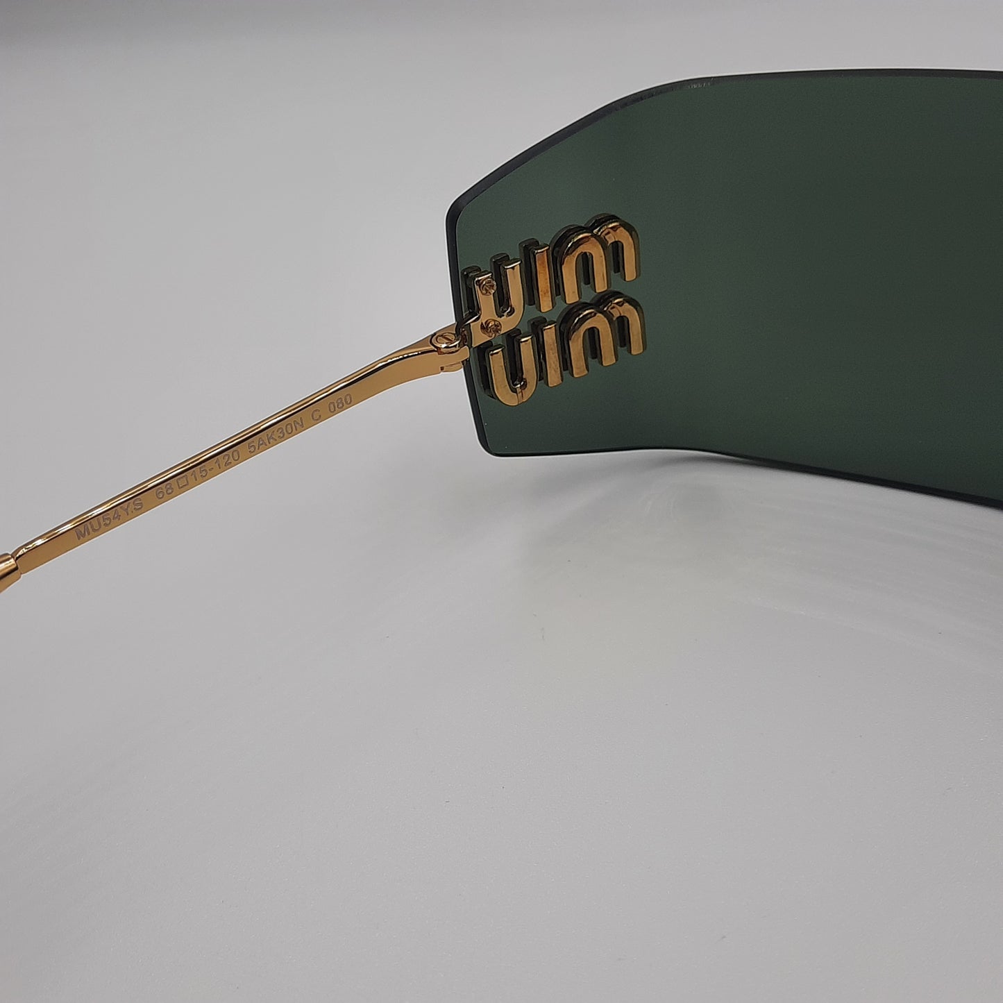 Solaires: MIUMIU MU54YS vert/GOLD