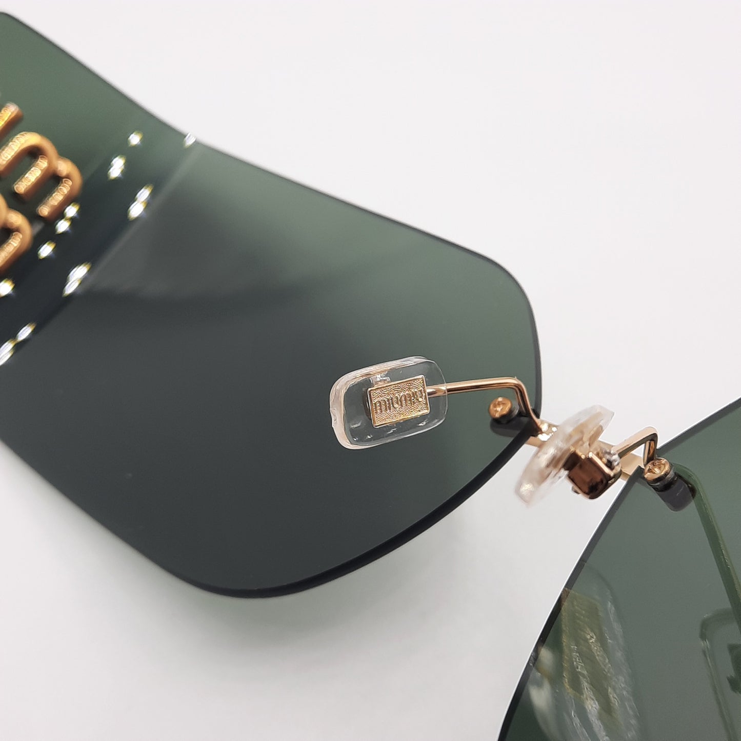 Solaires: MIUMIU MU54YS vert/GOLD