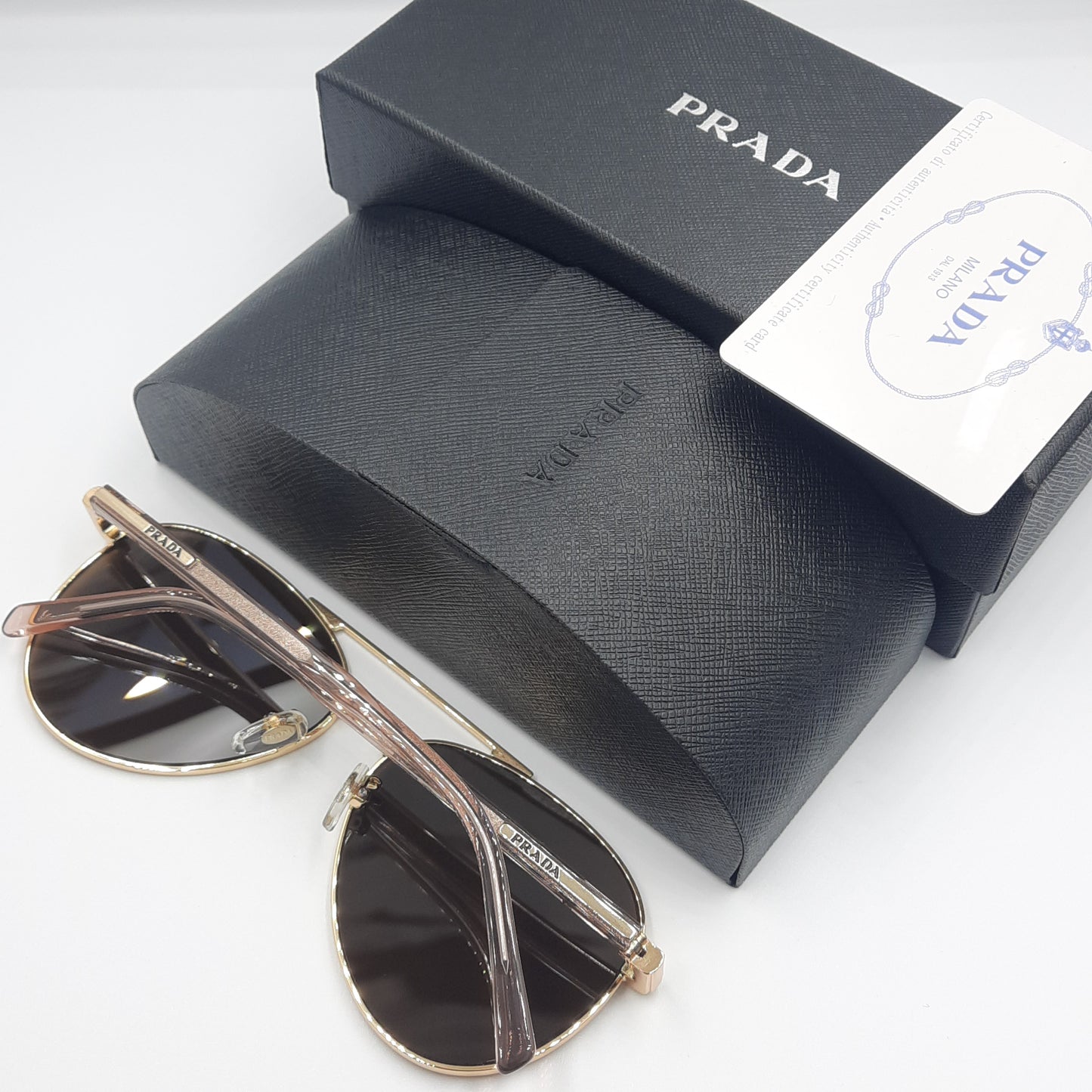 Solaires: PRADA SPRA58 rose gold