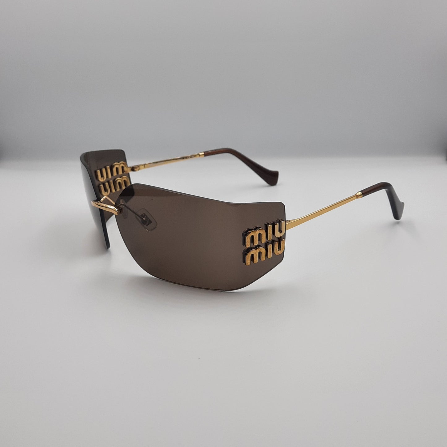 Solaires: MIUMIU MU54YS marron/GOLD