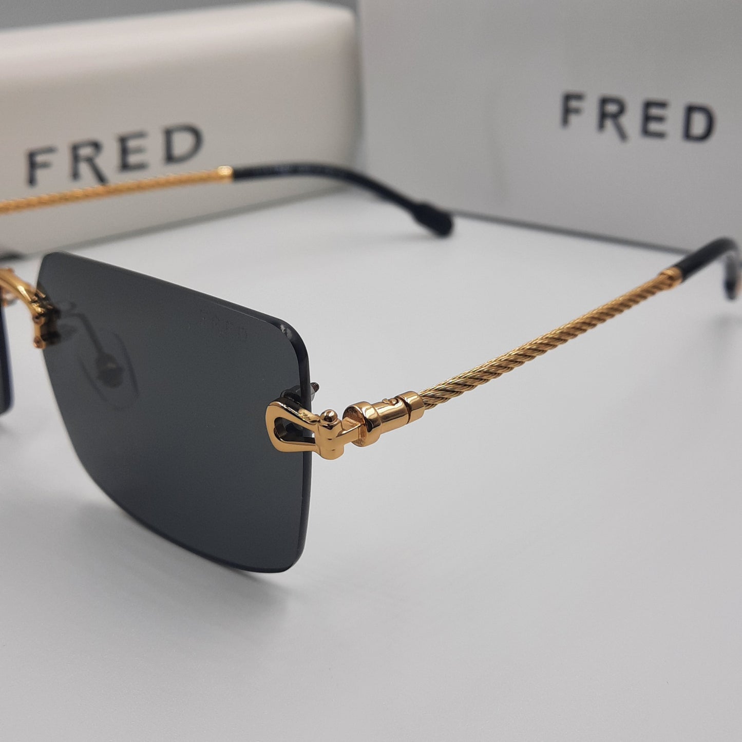 Solaires: FRED FG40023U doré noir