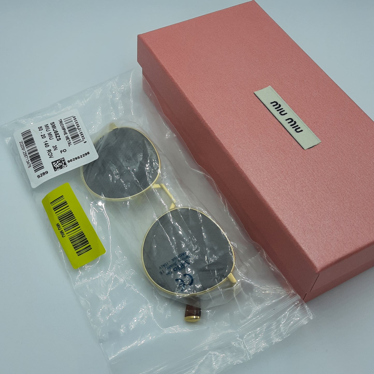 Solaires: MIUMIU SMU55ZS doré marron