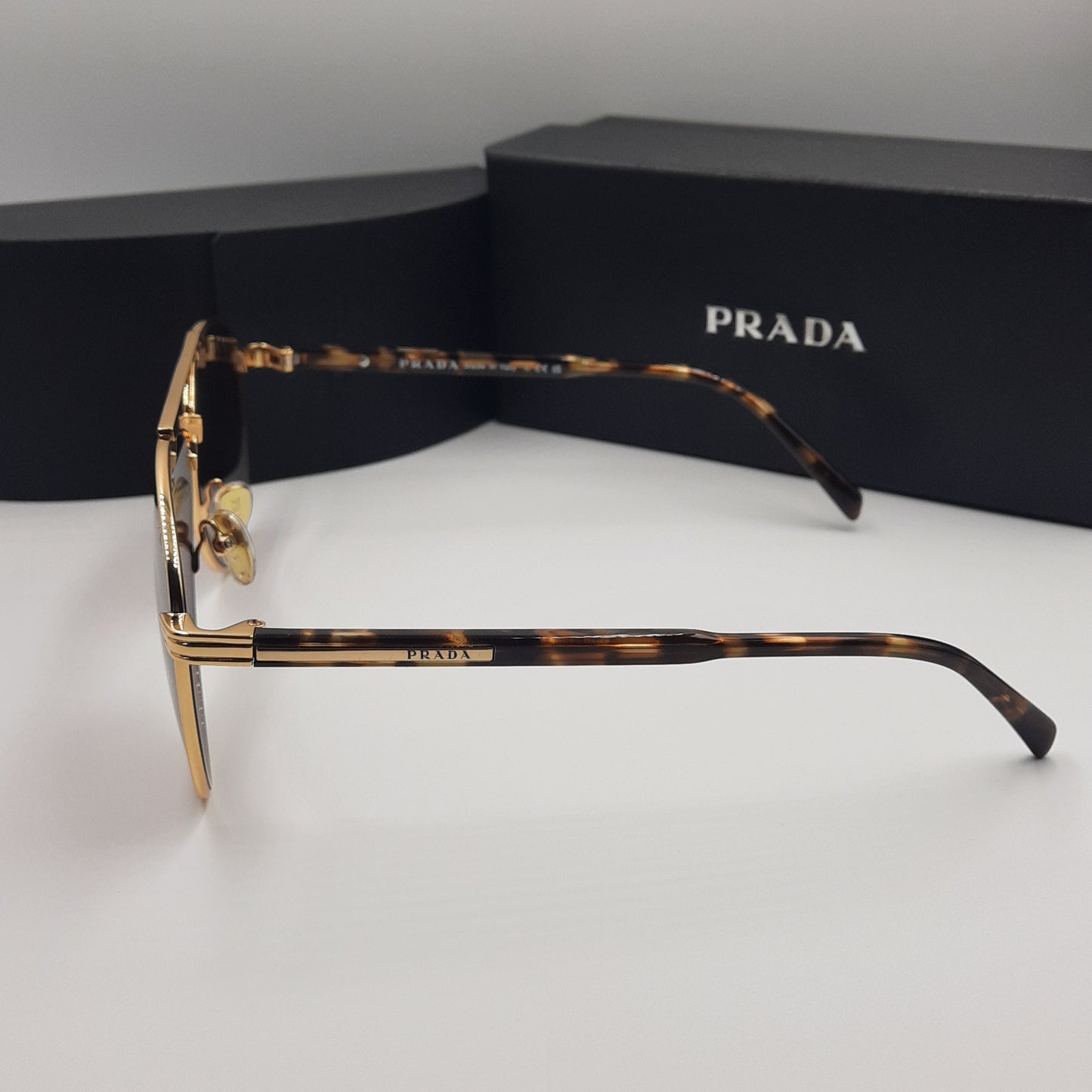Solaires: PRADA SPRA58 doré marron havane