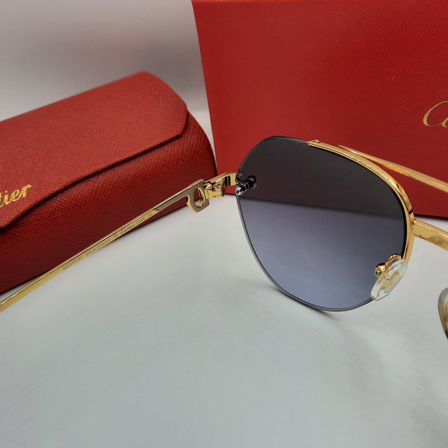 Solaires: CARTIER semi percé CT0427S doré noir