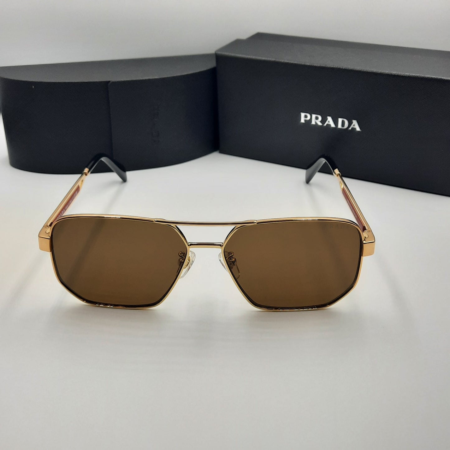 Solaires: PRADA OPS51ZS rouge doré marron