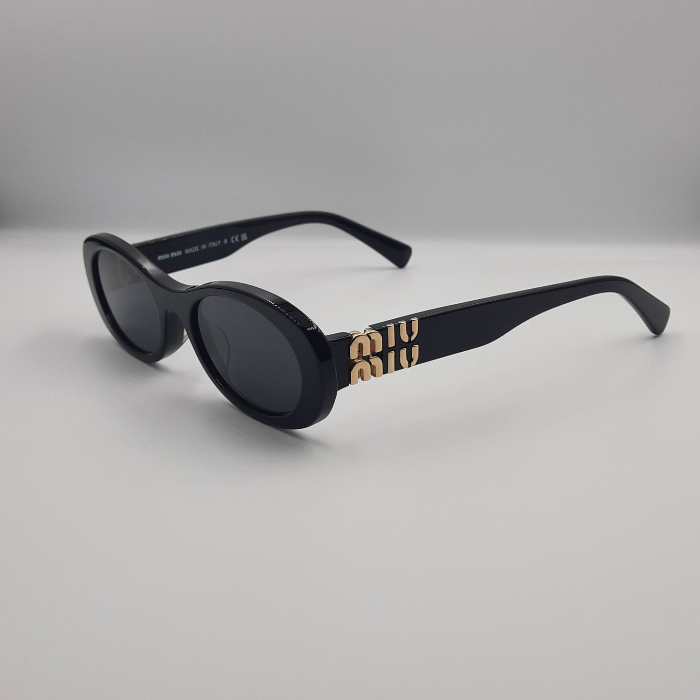 Solaires: MIUMIU SM06Z Noir/Doré