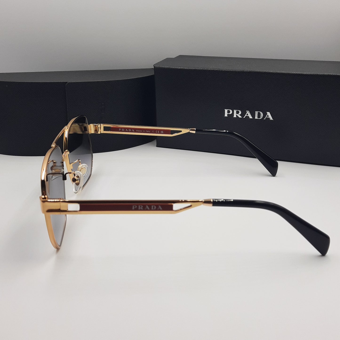Solaires: PRADA OPS51ZS rouge doré noir