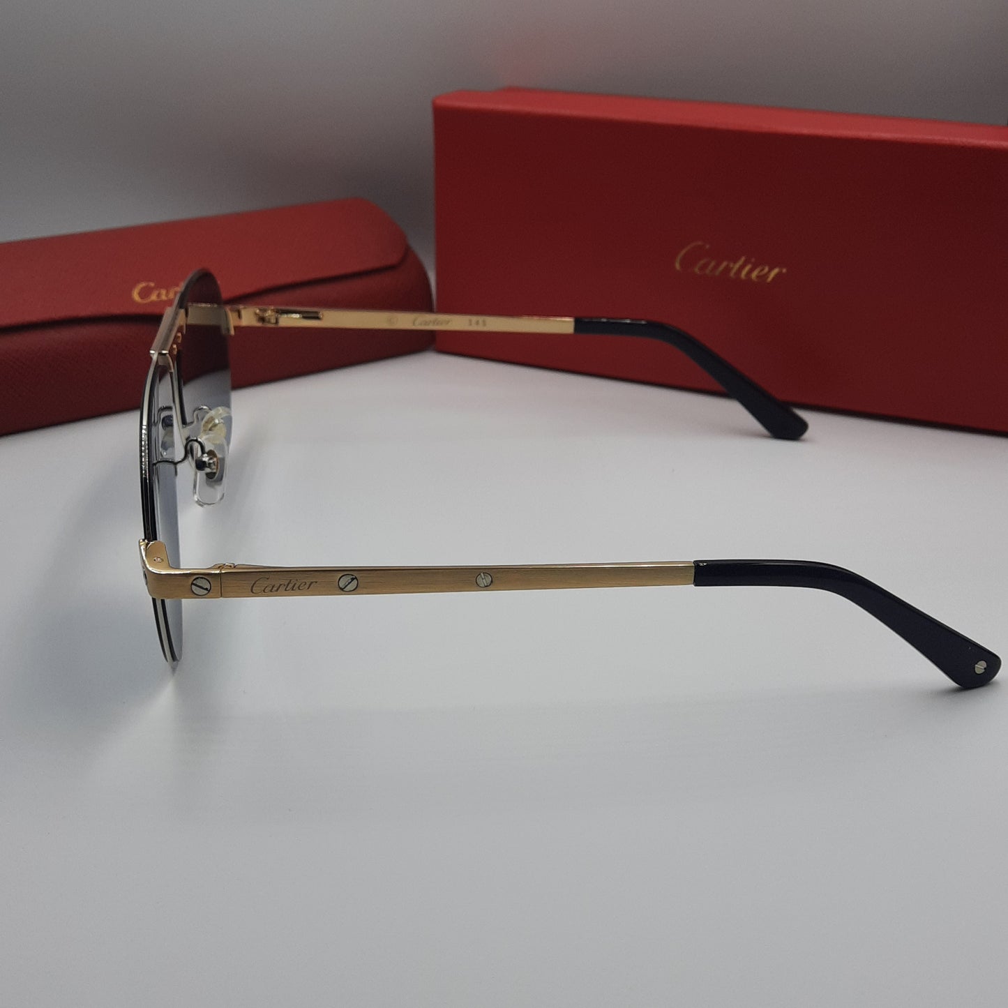 Solaires: CARTIER SANTOS CT0533S doré bleu foncé