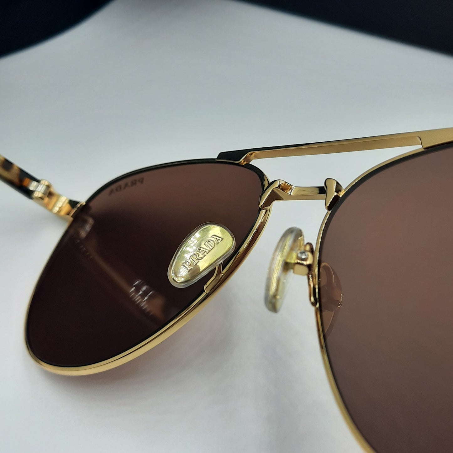 Solaires: PRADA SPRA58 doré marron havane