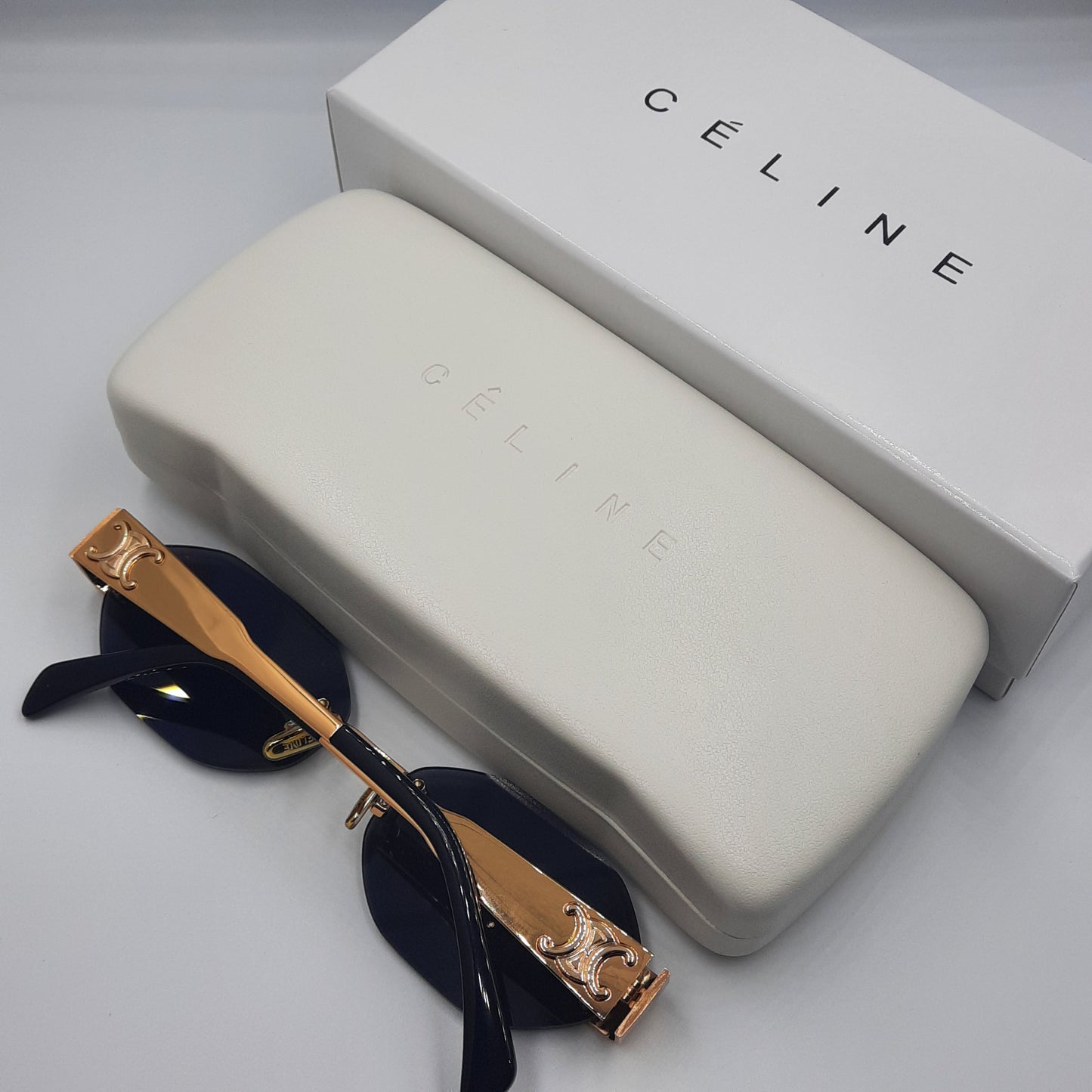 Solaires: CELINE Triomphe CL42119U doré noir