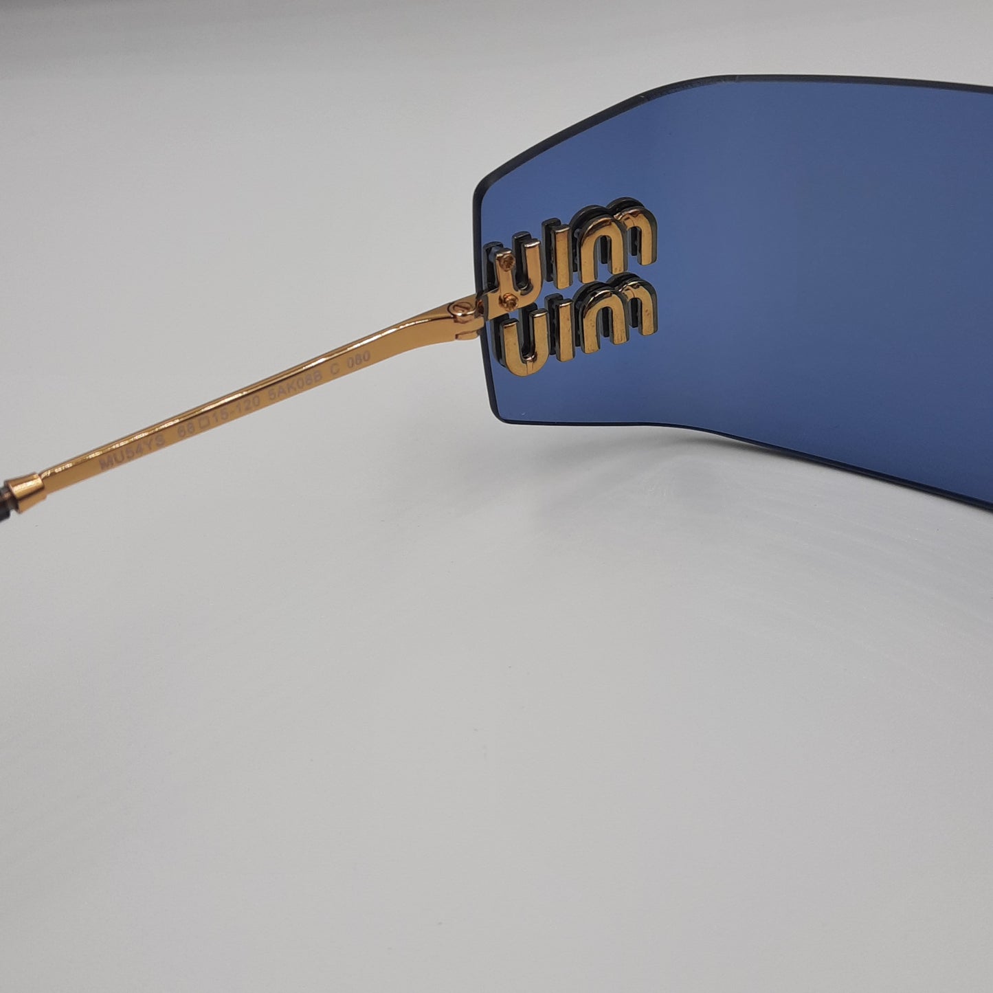 Solaires: MIUMIU MU54YS bleu/GOLD