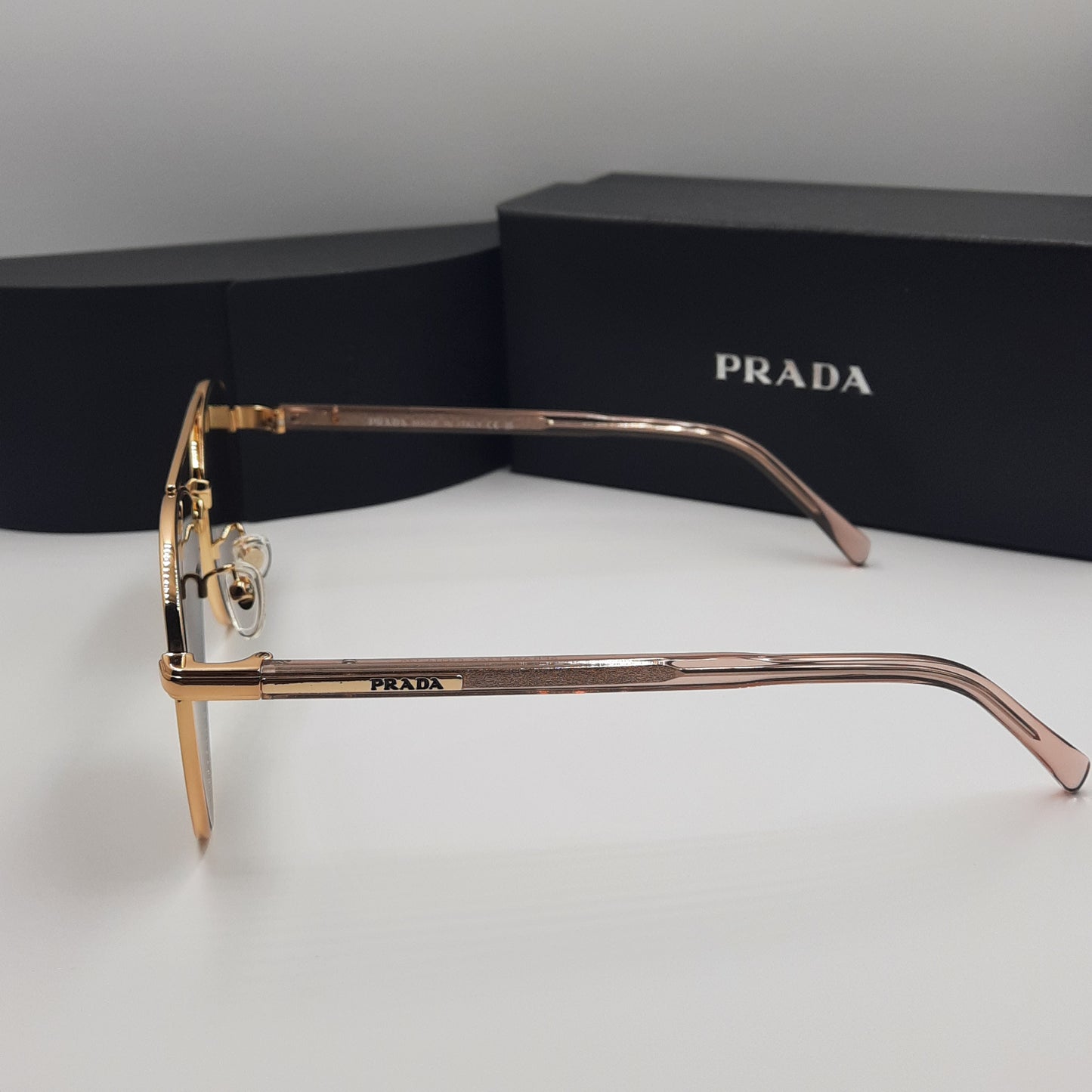 Solaires: PRADA SPRA58 rose gold