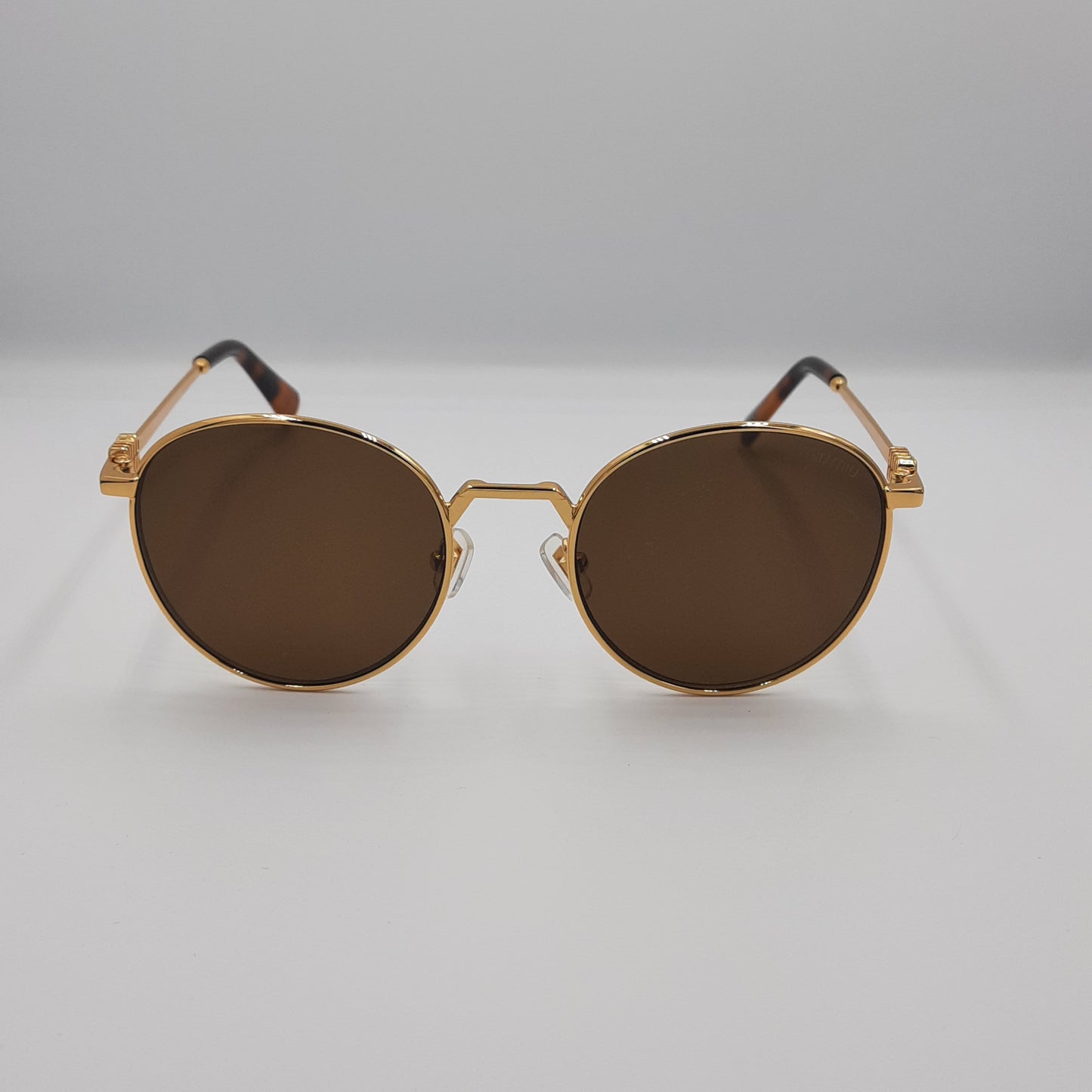 Solaires: MIUMIU SMU55ZS doré marron