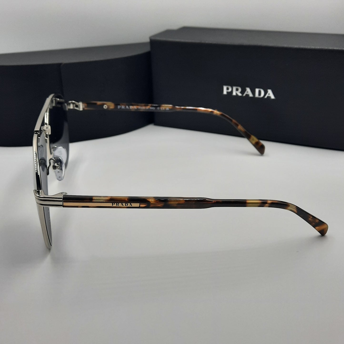 Solaires: PRADA SPRA58 argent tortoise