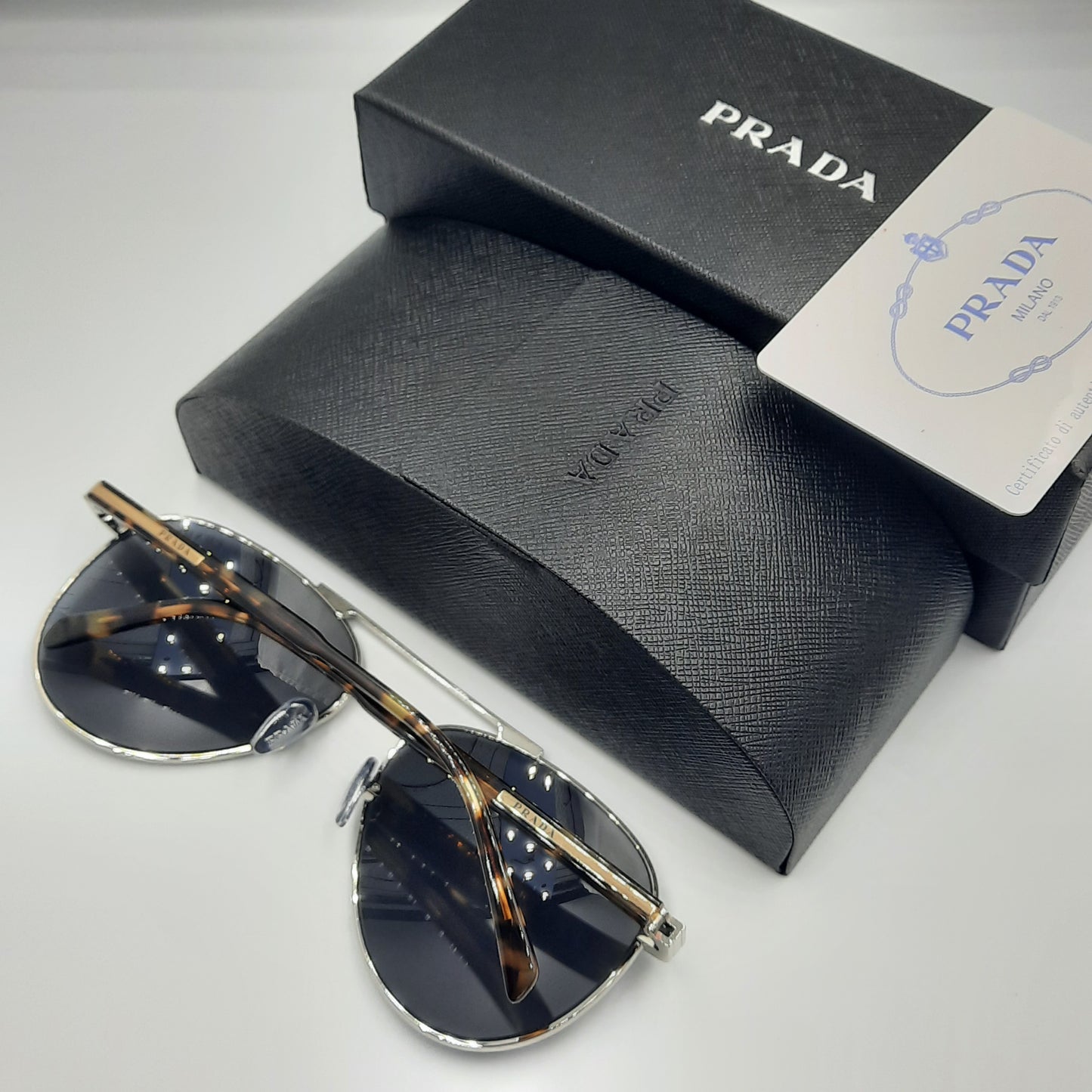 Solaires: PRADA SPRA58 argent tortoise